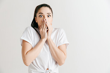 Image showing Portrait of the scared woman on gray