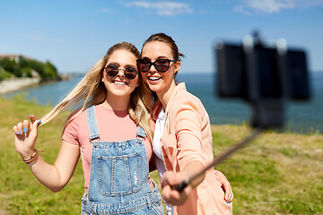 Image showing teenage girls or friends taking selfie in summer