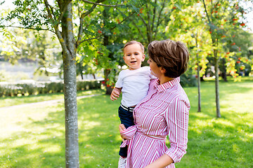 Image showing happy mother with little son in summer park