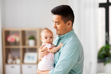 Image showing middle aged father with baby daughter at home