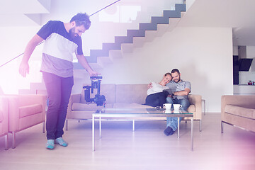 Image showing romantic couple relaxing at  home with tablet computers