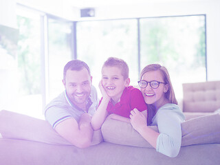 Image showing family with little boy enjoys in the modern living room