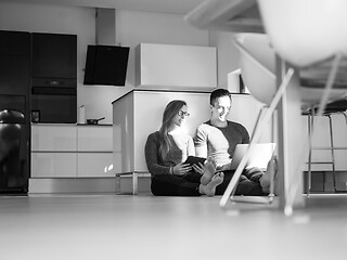 Image showing couple using tablet and laptop computers