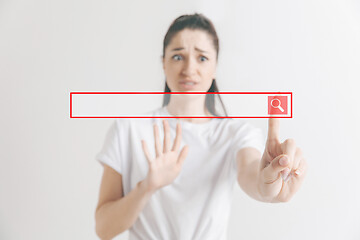 Image showing Woman\'s hand with finger on gray background