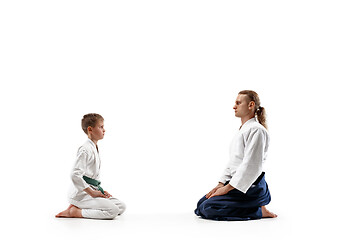 Image showing Man and teen boy at aikido training in martial arts school