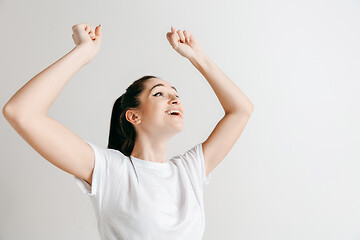 Image showing Winning success woman happy ecstatic celebrating being a winner.