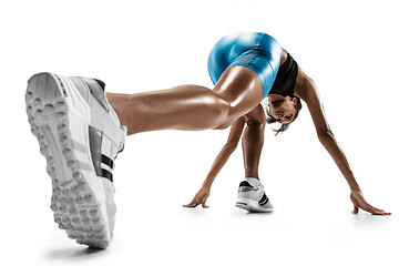 Image showing Young african woman running or jogging isolated on white studio background.