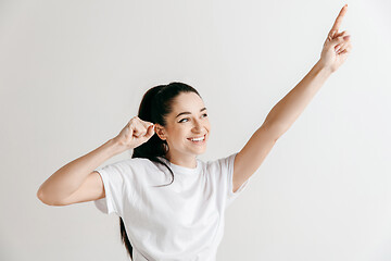 Image showing Winning success woman happy ecstatic celebrating being a winner.