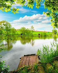 Image showing Wooden pier and calm river