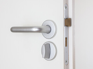 Image showing White door with chrome doorhandle