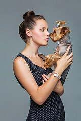 Image showing Girl with yorkie dog