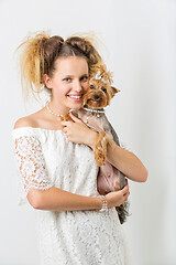 Image showing Girl with yorkie dog