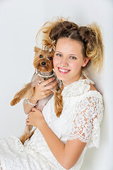 Image showing Girl with yorkie dog