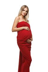 Image showing Pregnant girl in red dress