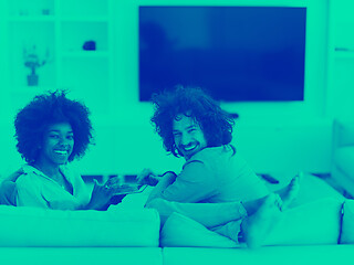 Image showing multiethnic couple in living room