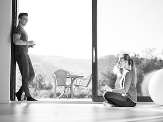 Image showing couple on the door of their luxury home