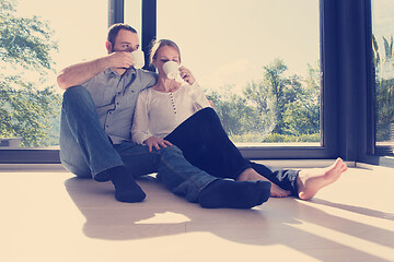 Image showing romantic couple enjoying morning coffee