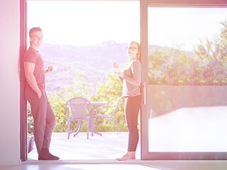 Image showing couple on the door of their luxury home villa