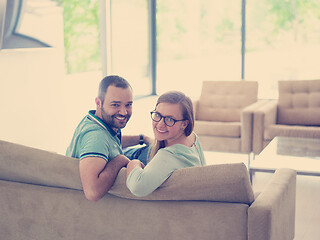 Image showing Rear view of couple watching television