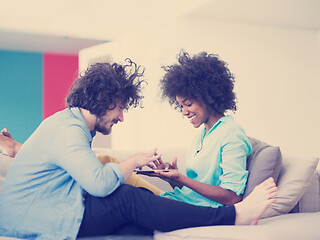Image showing multiethnic couple in living room