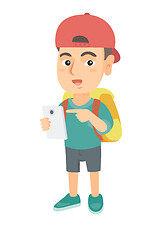 Image showing Caucasian boy with backpack pointing at cellphone.
