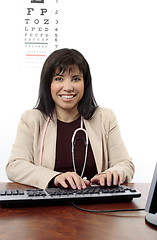 Image showing Doctor or Optometrist at desk
