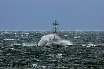 Image showing NATO military ship at sea during a storm.