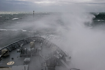 Image showing NATO military ship at sea during a storm.