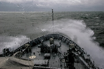 Image showing NATO military ship at sea during a storm.