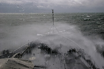 Image showing NATO military ship at sea during a storm.