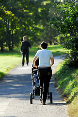 Image showing Woman with pram