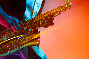 Image showing African American jazz musician playing the saxophone.