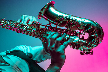 Image showing African American jazz musician playing the saxophone.