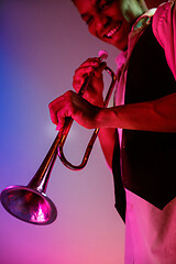 Image showing African American jazz musician playing trumpet.