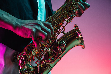 Image showing African American jazz musician playing the saxophone.