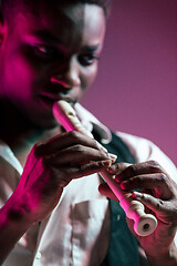 Image showing African American jazz musician playing pipe.