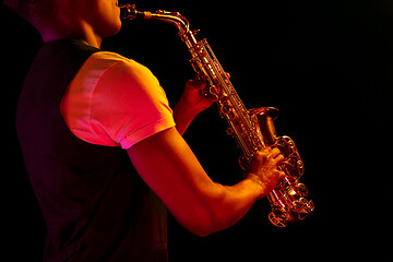 Image showing African American jazz musician playing the saxophone.