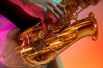 Image showing African American jazz musician playing the saxophone.