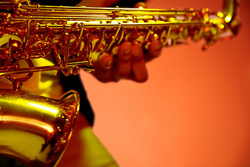 Image showing African American jazz musician playing the saxophone.