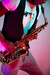 Image showing African American jazz musician playing the saxophone.