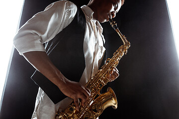 Image showing African American jazz musician playing the saxophone.