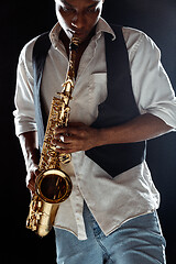 Image showing African American jazz musician playing the saxophone.