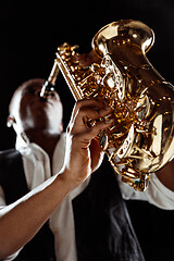 Image showing African American jazz musician playing the saxophone.