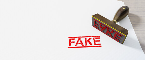 Image showing red fake stamp on white paper background