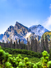 Image showing Polish Tatra mountains summer landscape with blue sky and white clouds.