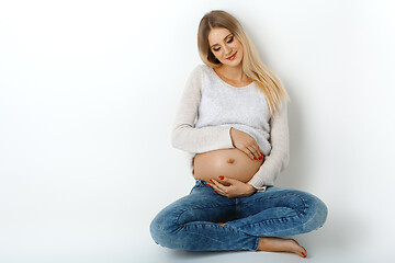 Image showing Beautiful pregnant woman in jeans