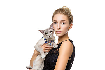 Image showing Beautiful girl with oriental siam cat