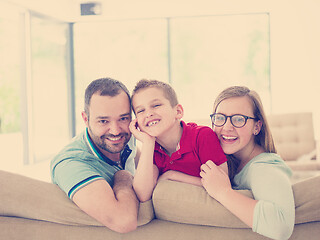 Image showing family with little boy enjoys in the modern living room