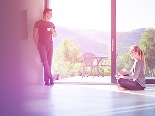 Image showing couple on the door of their luxury home