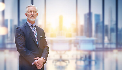 Image showing Senior businessman in his office